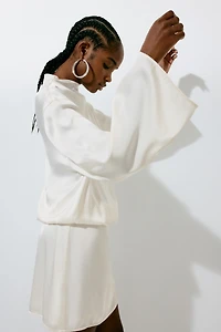 Robe en satin à effet drapé