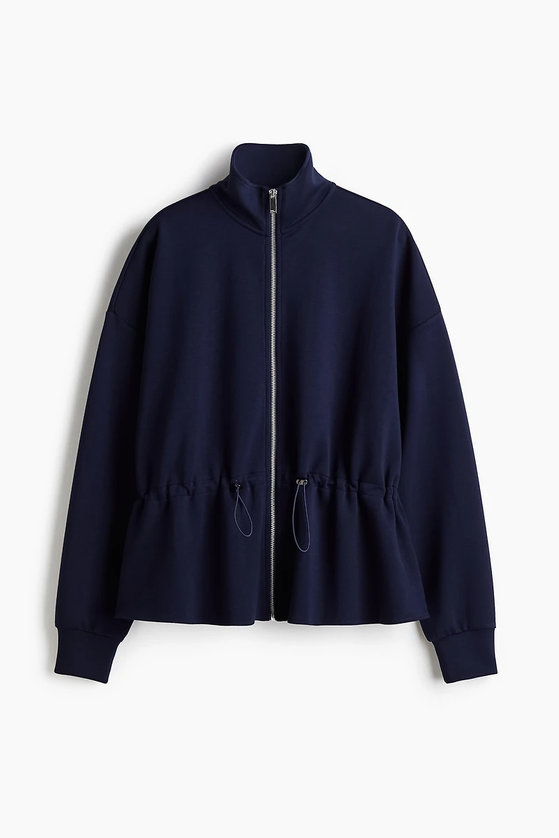 Chandail péplum à fermeture éclair