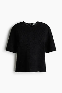 Haut à l’aspect crochet