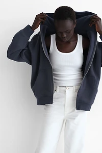 Veste ample avec capuche et fermeture éclair