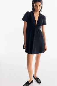 Robe en popeline de coton à encolure V