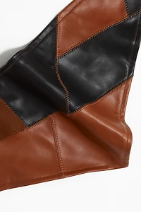 Foulard triangulaire en tissu enduit