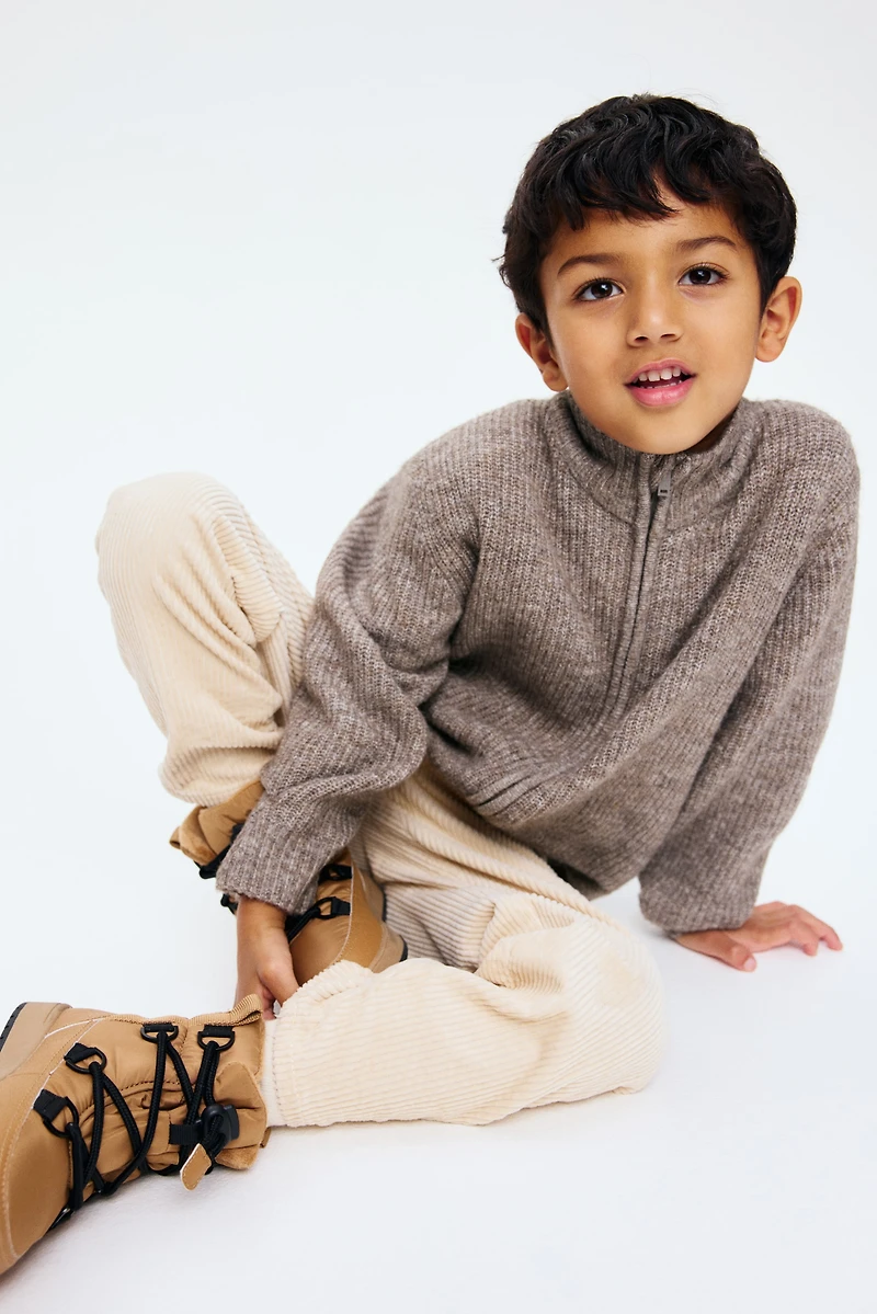 Chandail à fermeture éclair en tricot côtelé