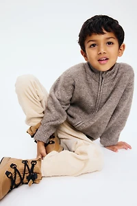 Chandail à fermeture éclair en tricot côtelé