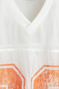 T-shirt très grand en filet imprimé