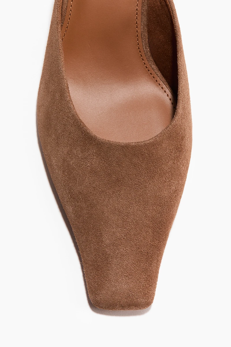 Mules en cuir avec talon conique