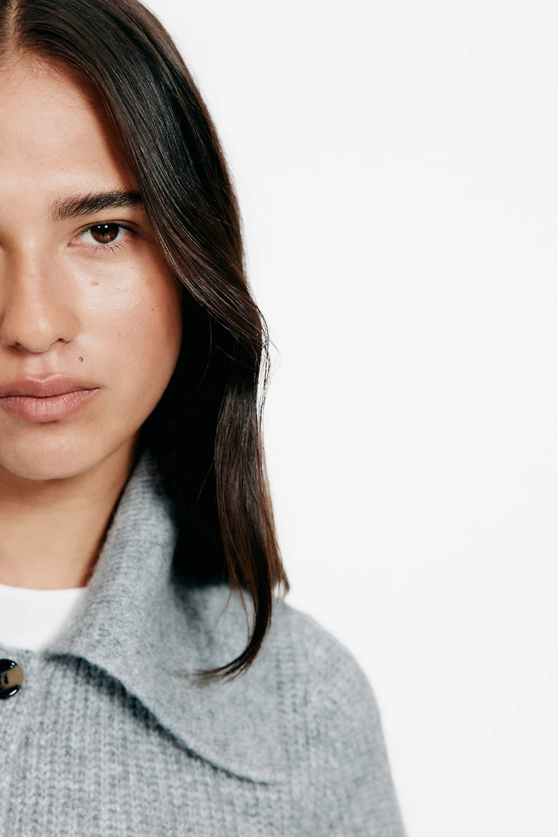 Gilet en tricot côtelé avec col