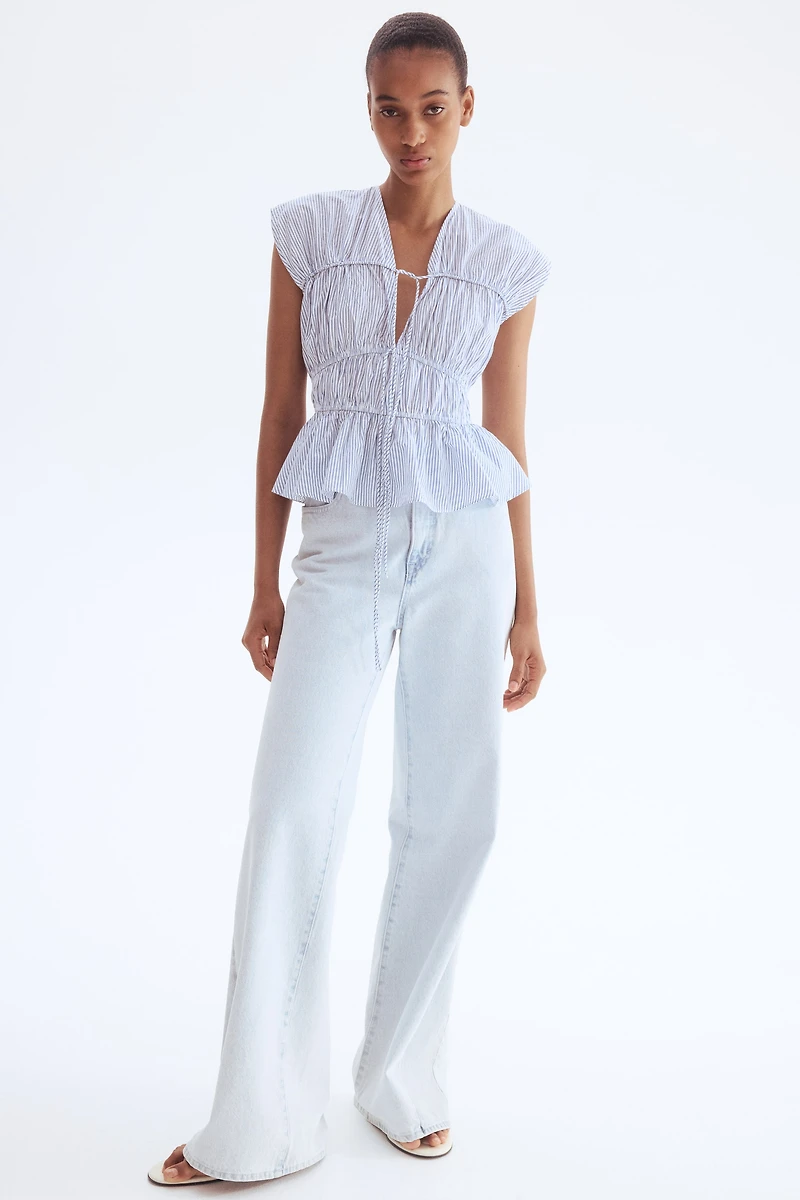 Blouse en popeline avec cordons de serrage