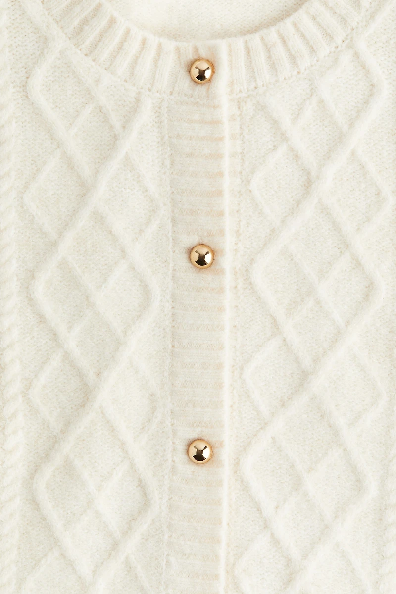 Gilet en tricot torsadé