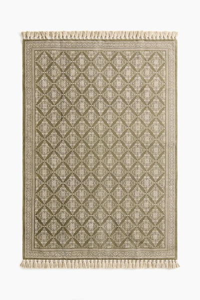 Tapis à motif avec franges