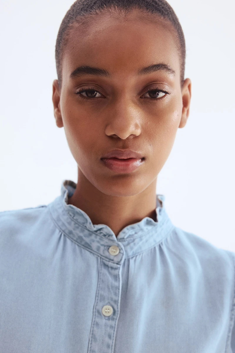 Ruffle-Trimmed Denim Blouse
