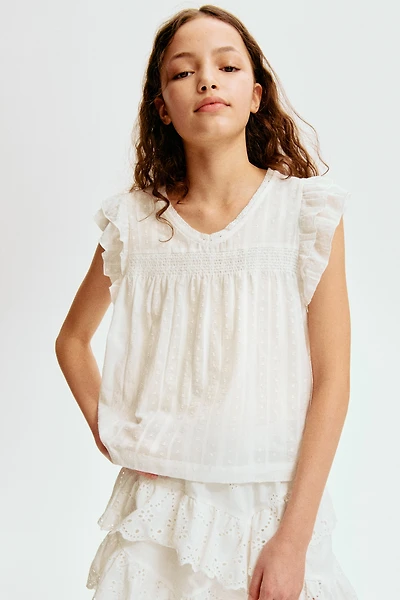 Blouse à manches volantées