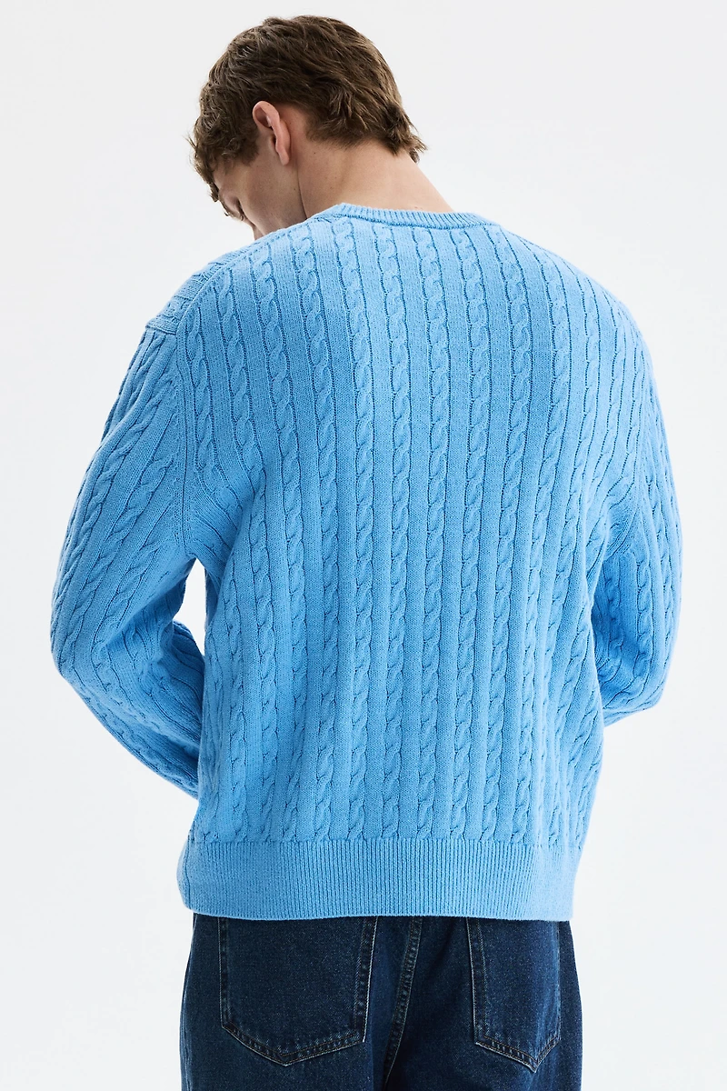 Chandail classique en tricot torsadé