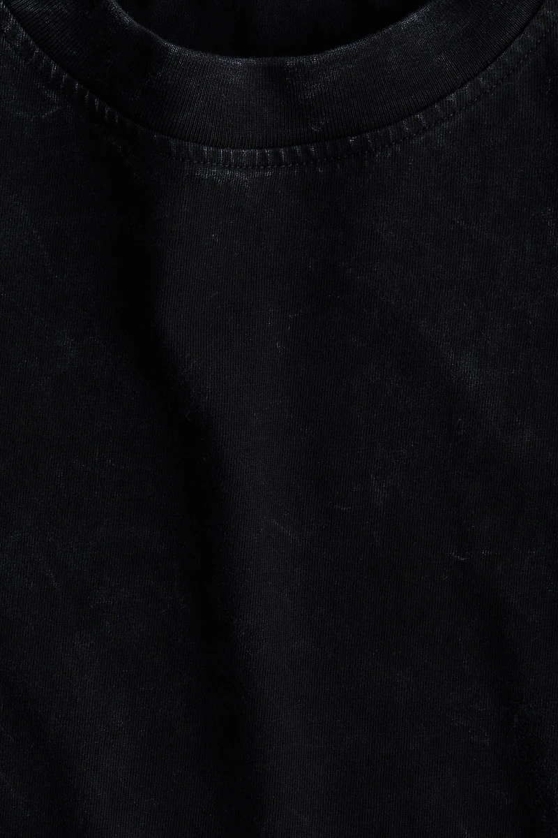 Haut en coton à l'aspect délavé