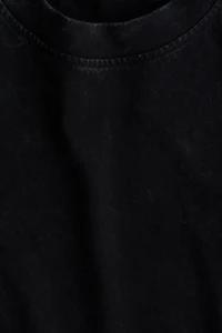 Haut en coton à l'aspect délavé