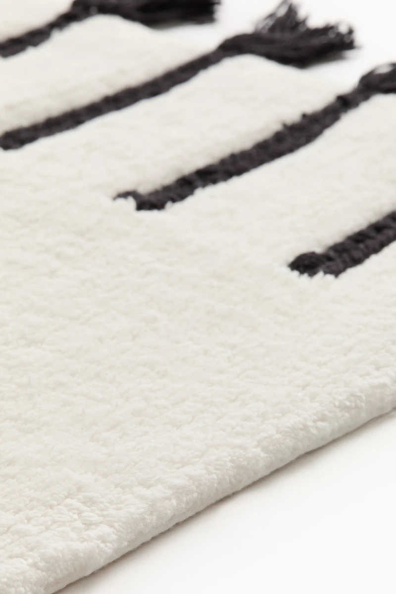 Tufted Bath Mat with Tassels