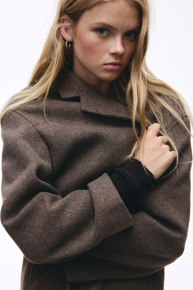 Manteau à fermeture droite