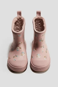 Bottes en caoutchouc doublées de polar