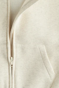 Veste grande taille à capuchon et fermeture éclair