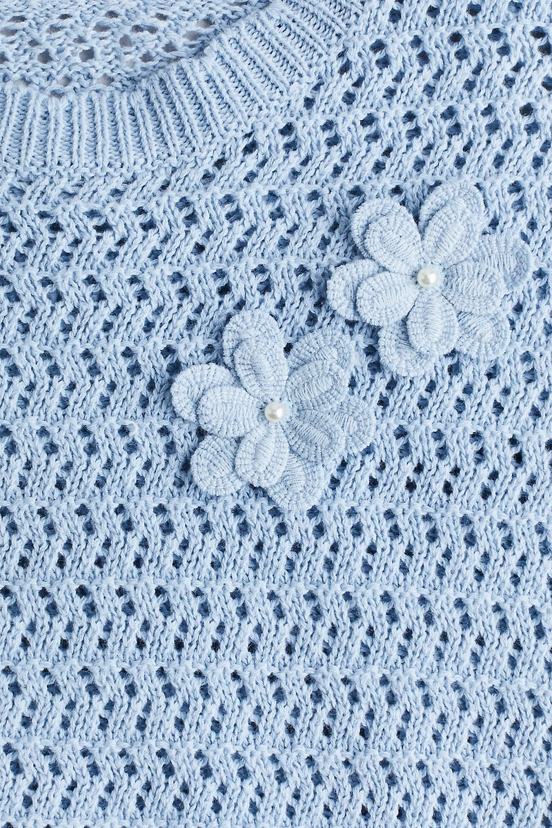 Chandail en tricot de coton ajourée