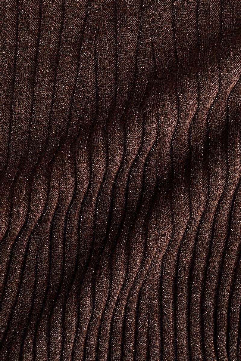 Haut scintillant avec col cheminée