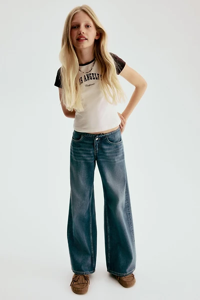 Jean taille basse jambes très larges