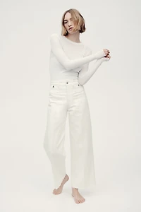 Jean large à la cheville taille haute