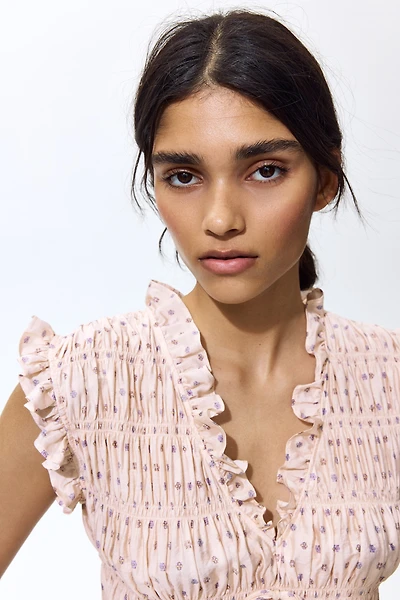 Blouse sans manches en nid d'abeille