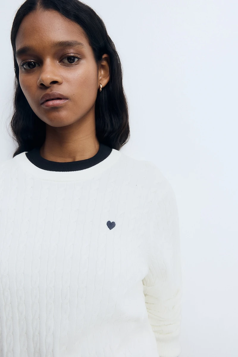 Chandail en tricot torsadé