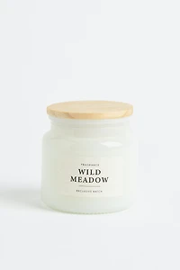 Bougie parfumée dans un pot en verre