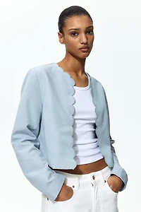 Veste à bords festonnés