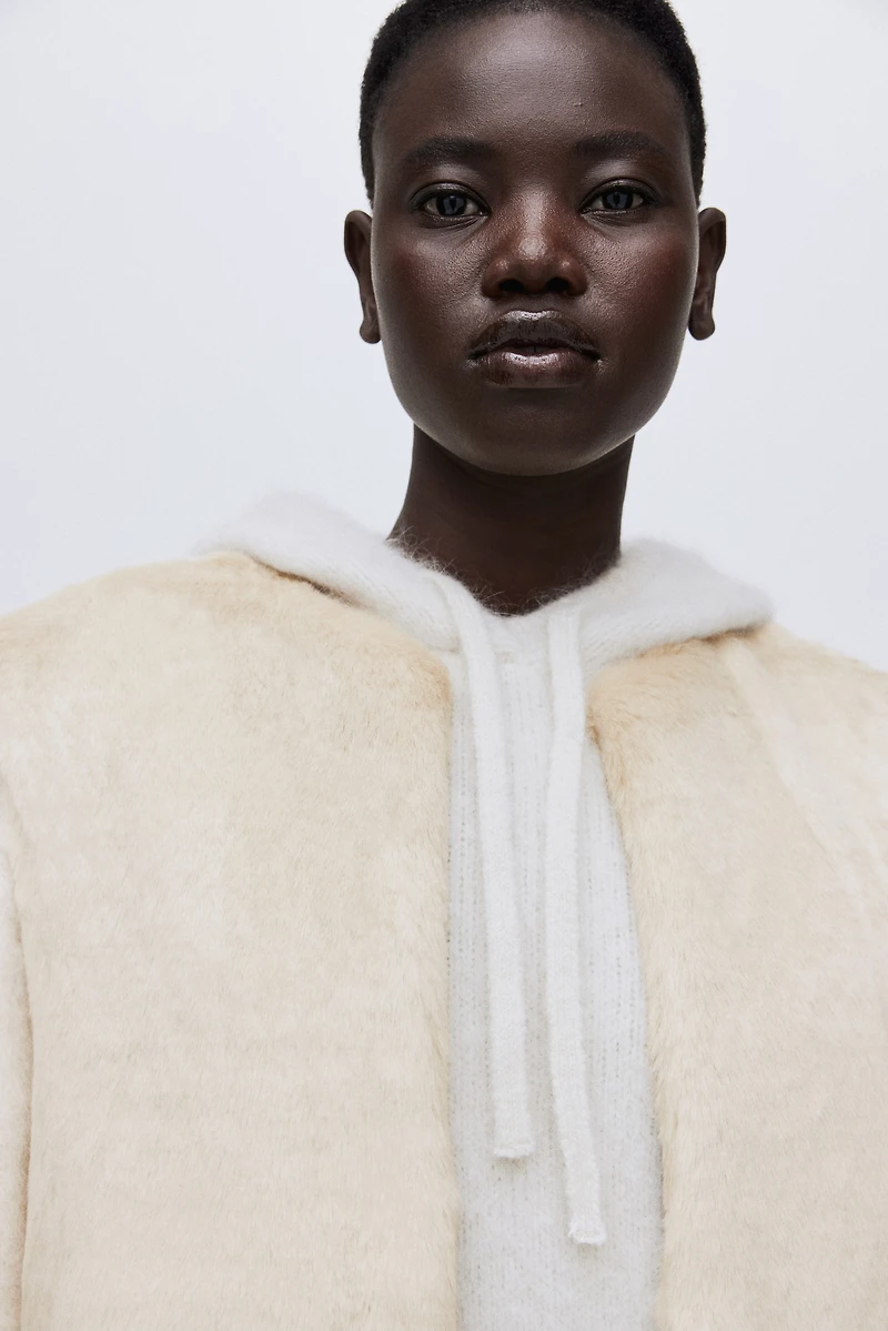 Longue veste sans manches