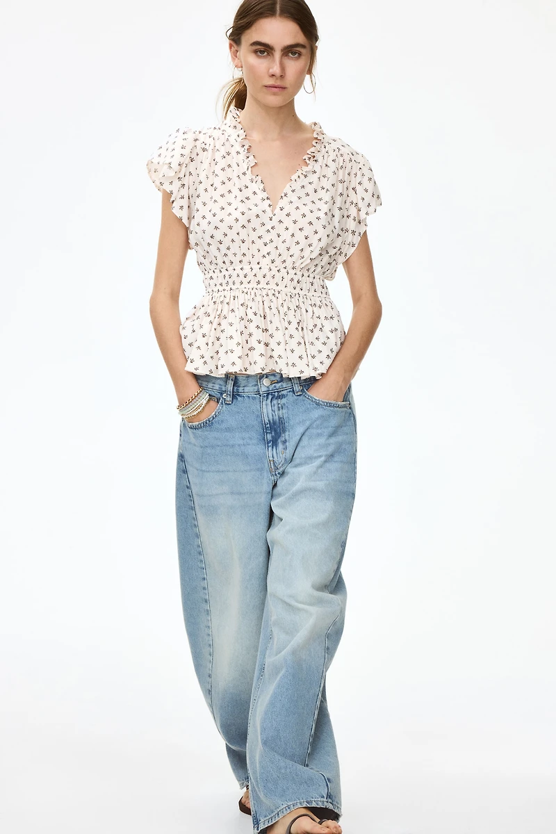 Flutter-Sleeved Peplum Blouse