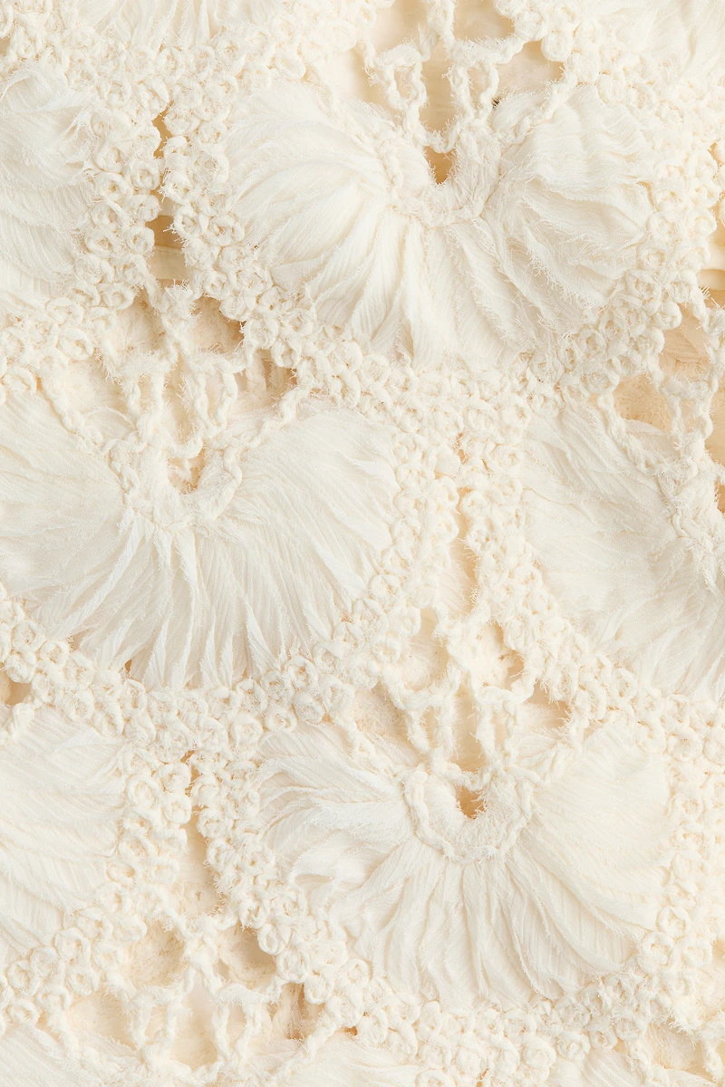 Jupe droite à l’aspect crochet