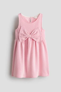 Robe avec boucle devant