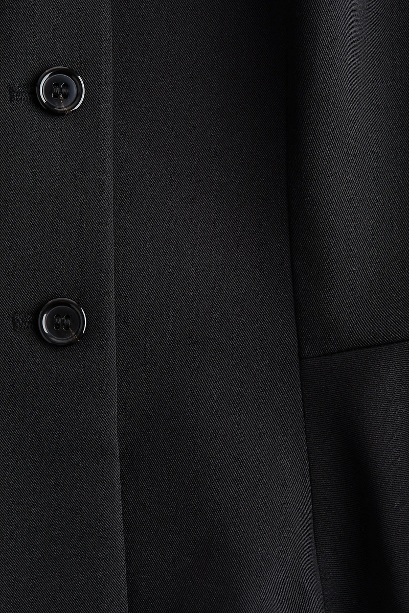 Chandail sans manches avec encolure en V et basque