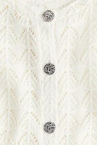Chandail en tricot pointelle