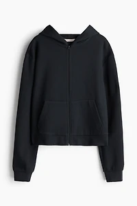 Veste gaufrée avec capuchon et glissière