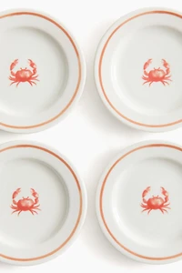 Lot de 4 petites assiettes en porcelaine