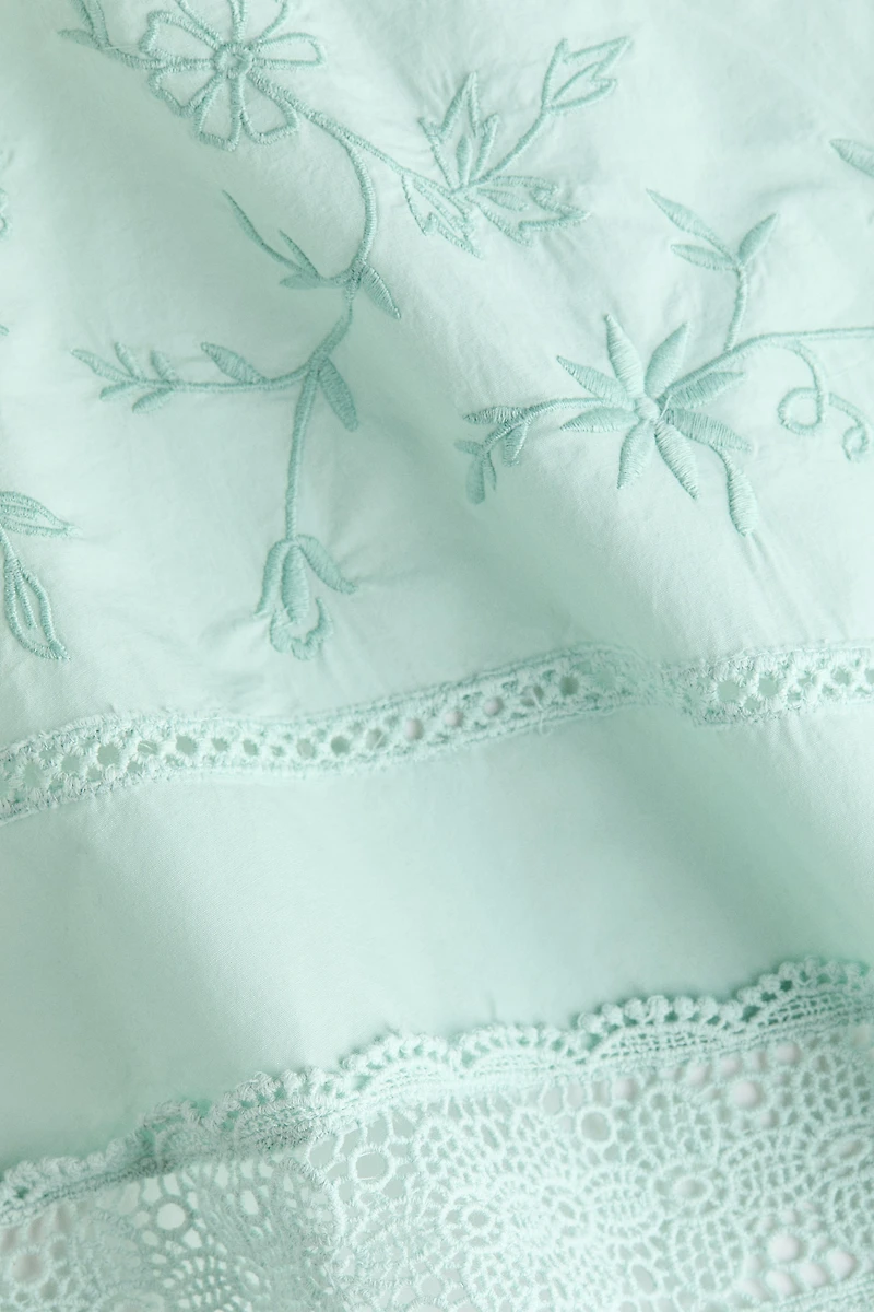 Lace-Trimmed One-Shoulder Top