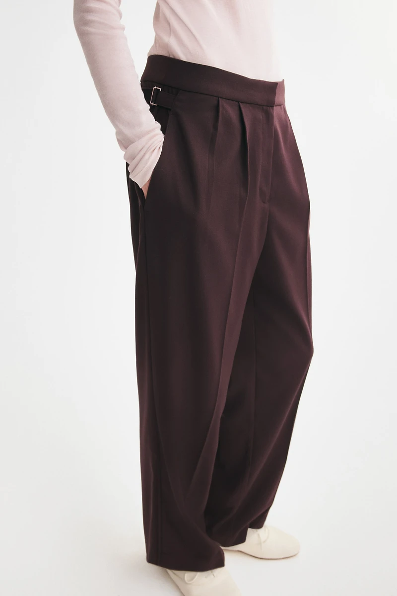 Pantalon à pinces avec pattes