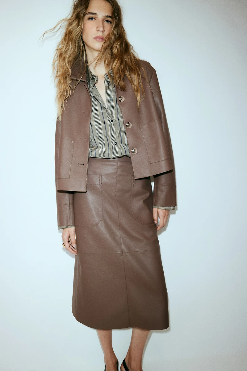 Veste en tissu enduit