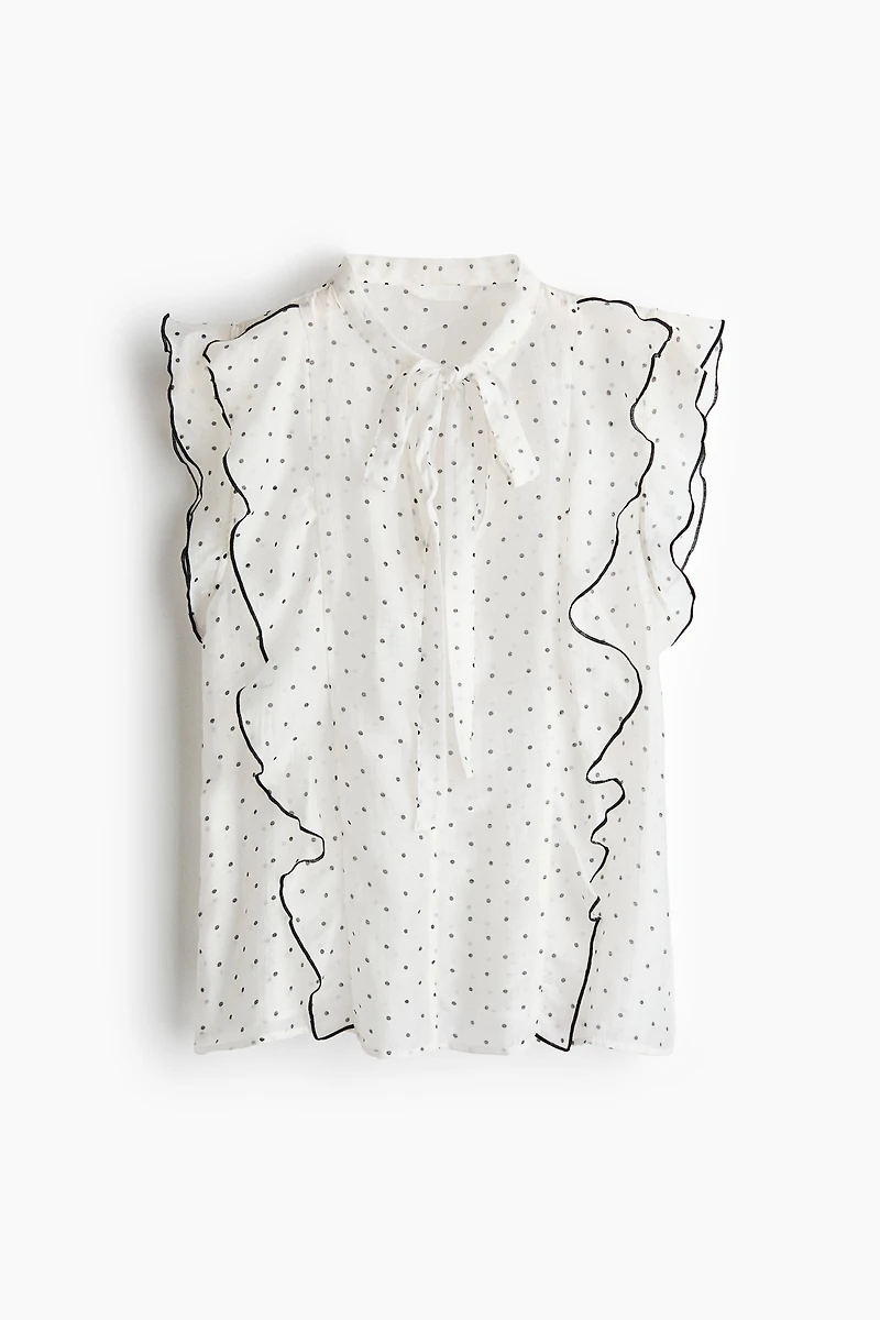 Blouse à volant avec col cravate