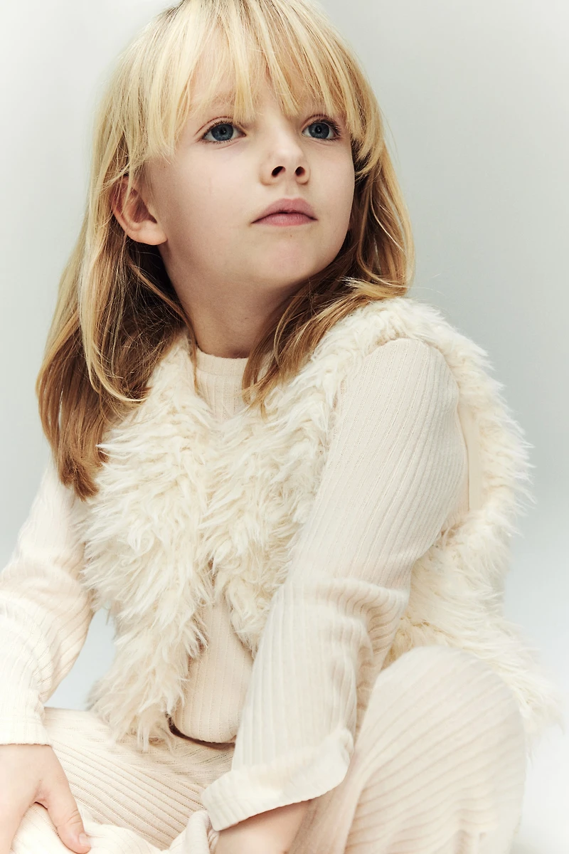 Veste sans manches duveteuse