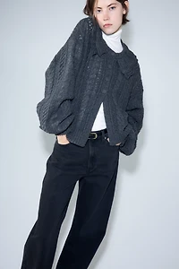 Gilet en maille torsadée avec col