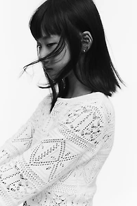 Haut court en tricot pointelle