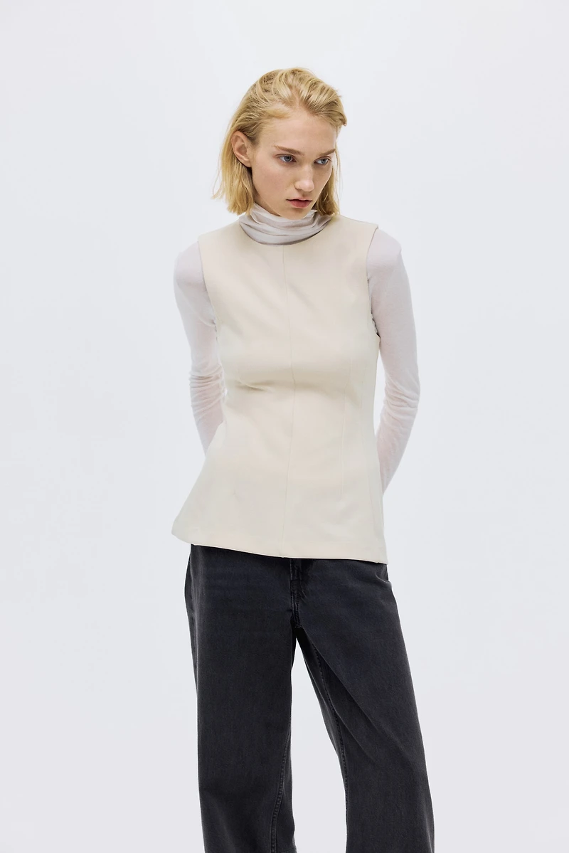 Haut péplum en jersey point de Rome