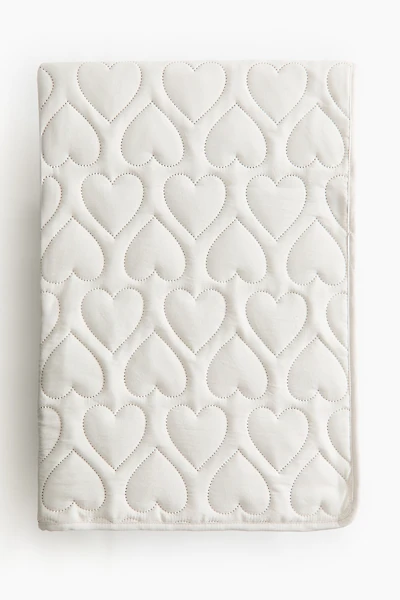 Couvre-lit matelassé