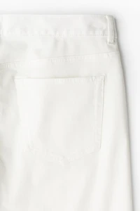 Pantalon aminci en tissu croisé de coton