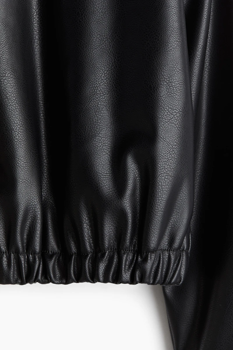 Veste en tissu enduit